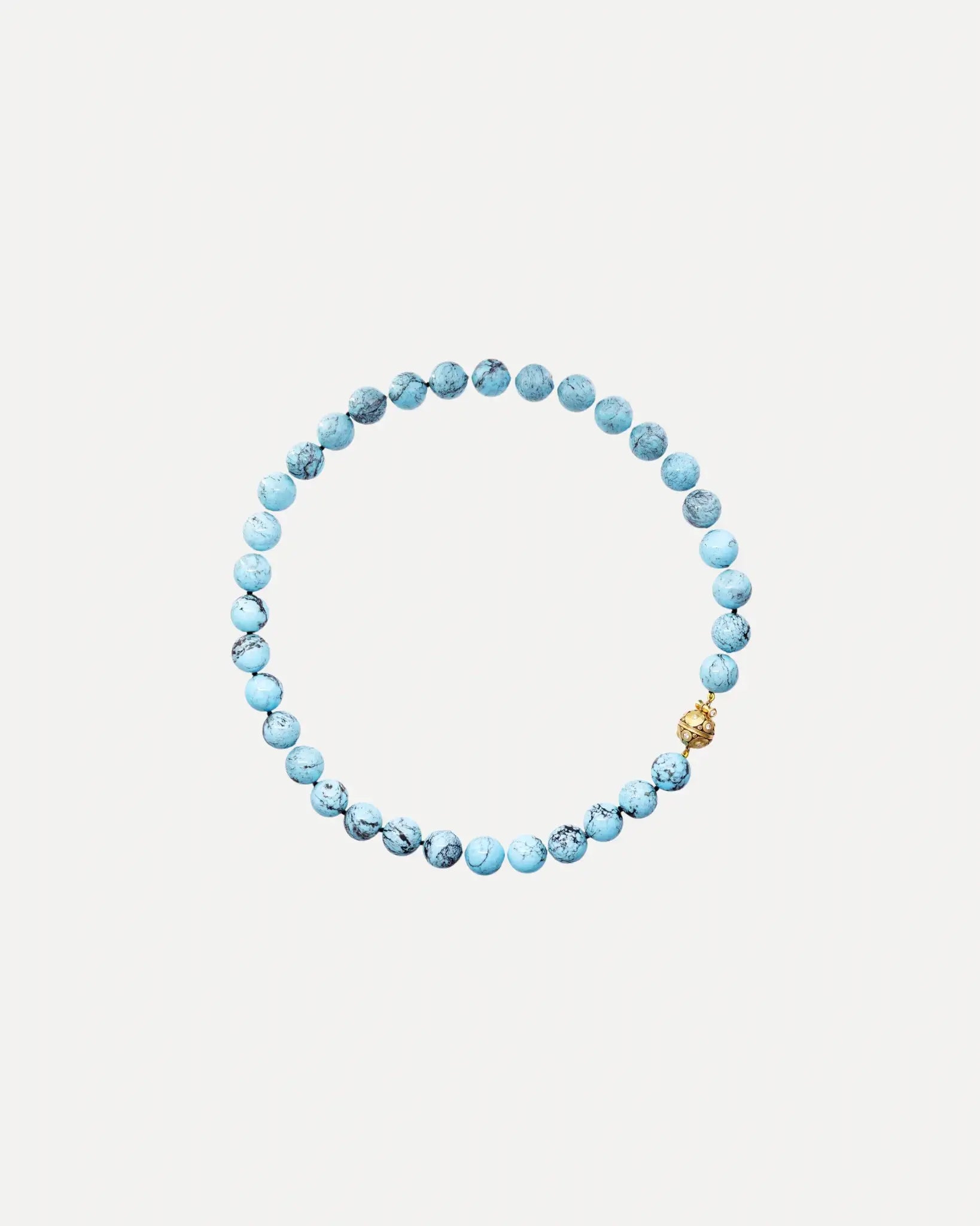 A turquoise beaded necklace by Alex Sepkus.