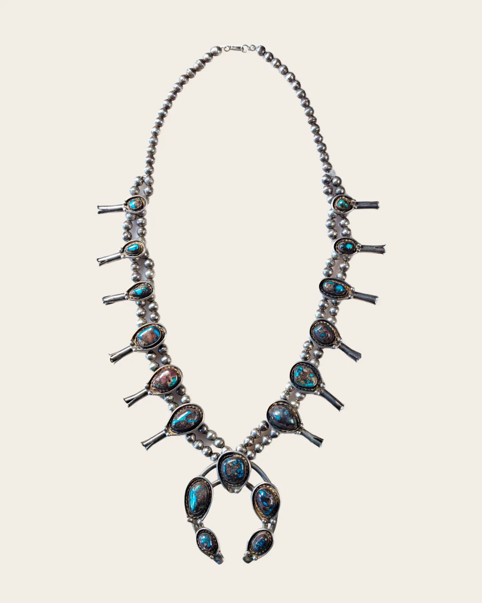 Native American made squash blossom turquoise necklace by Gilbert Nez –  Buckin' Flamingo