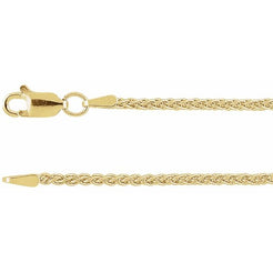 Gold chain necklace with clasp on a white background