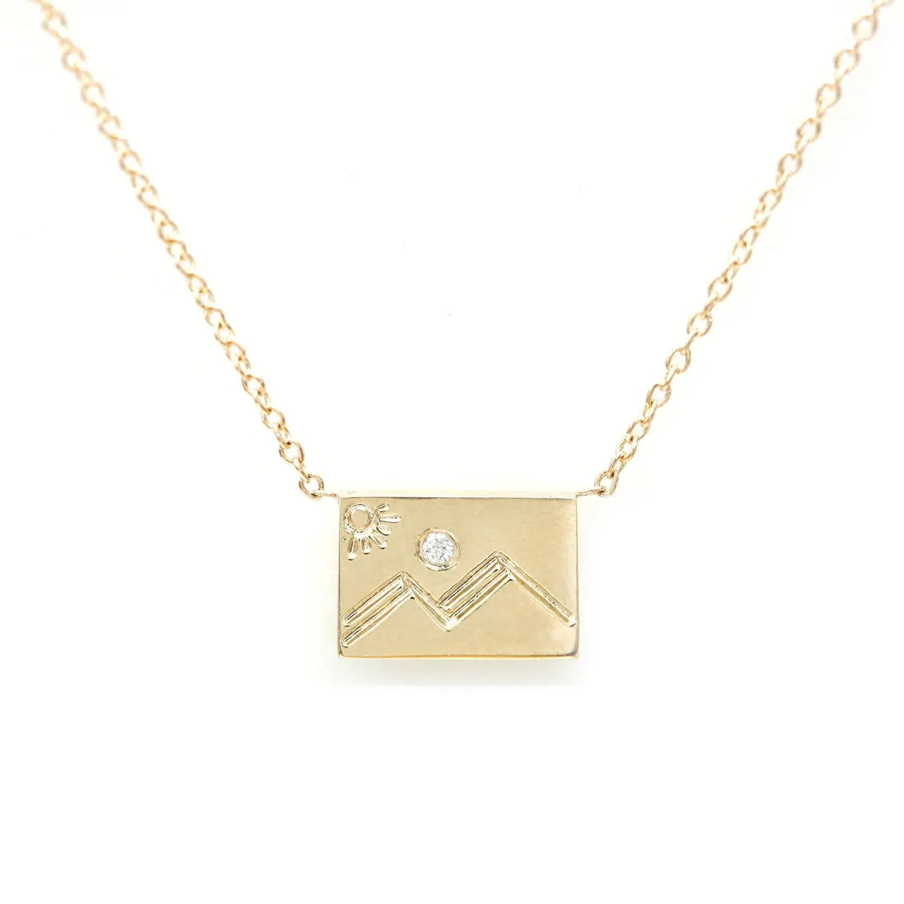 14K Yellow gold and white diamonds mountain post charm necklace  Length: 16" chain  Charm measures 7.5mmx5mm  Designed Aili Jewelry14K Yellow gold and white diamonds mountain post charm necklace  Length: 16" chain  Charm measures 7.5mmx5mm  Aili Jewelry is made in New York City from recycled metals provided by sustainable certified companies and conflict free diamonds.