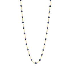 Stack you necklace layers with this versatile beaded chain! The Classic Gigi Necklace by gigi CLOZEAU features 18 carat yellow gold, and striking Midnight resin jewels for an everyday effortless appearance. Handcrafted in 18k yellow gold. The beads measure 1.50mm in diameter and is finished with a spring ring clasp. The length is 16.5 inches.