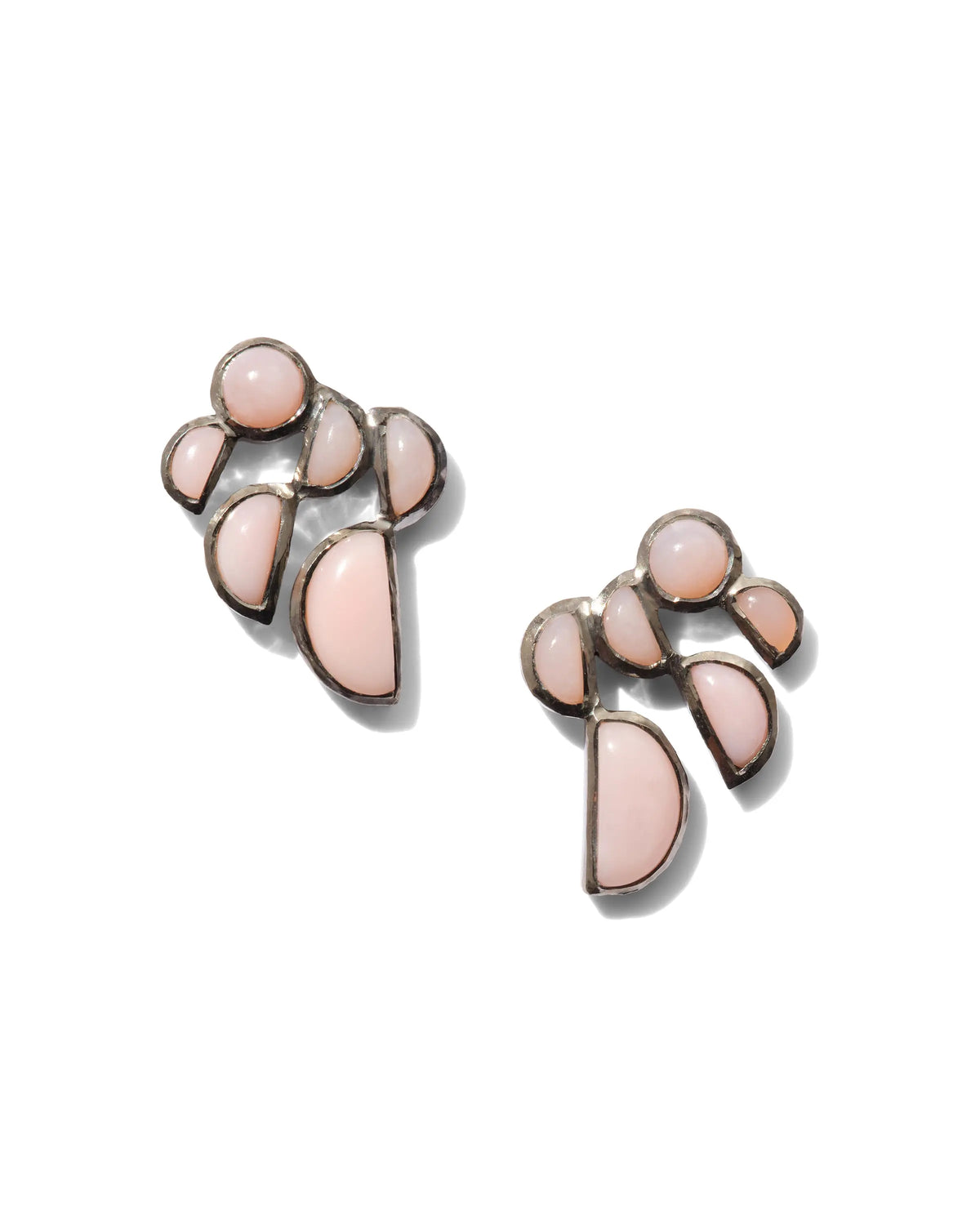 Designed by Nak Armstrong these earrings are so much fun. They are set in sterling silver with a black rhodium finish and pink opal. They measure 3/4&quot; in diameter and are post and nut closure.