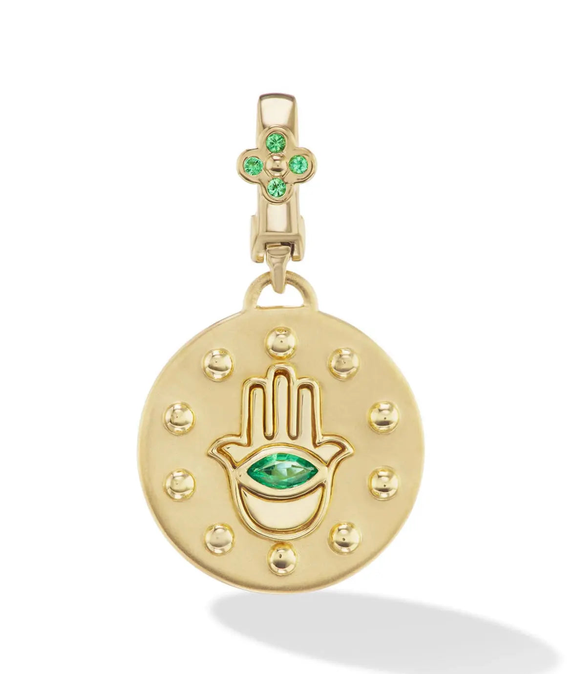 18k Small Green Hamsa Pendant in emerald   Daily Reminder: I Am Protected   Revered for its protective qualities, the Hamsa is an ancient Middle Eastern motif that symbolizes the “Hand of God” and helps to nurture good health and happiness. Our Small Hamsa Pendant is set with a Rubies or Diamonds for extra protection.  SPECIFICATIONS  18K Yellow Gold Size: 16mm  Stones: Emeralds The bale is set with four Rubies and opens enabling easy interchange with other OM jewels