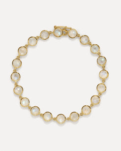 The round link bracelet highlights the beauty of rose-cut rainbow moonstones scalloped coin-edge set in 18k yellow gold  7 inches in length Designed and handmade in Los Angeles Designed by Irene Neuwirth
