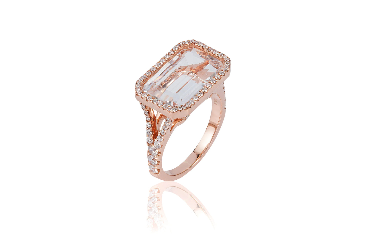 Gossip' Rock Crystal East West Emerald Cut Ring With Diamonds in 18K Pink Gold. The stone size is ~ 10 x 15 mm. The Rock Crystal is ~ 6.92 cttw and the Diamond ~ 0.54 cttw.