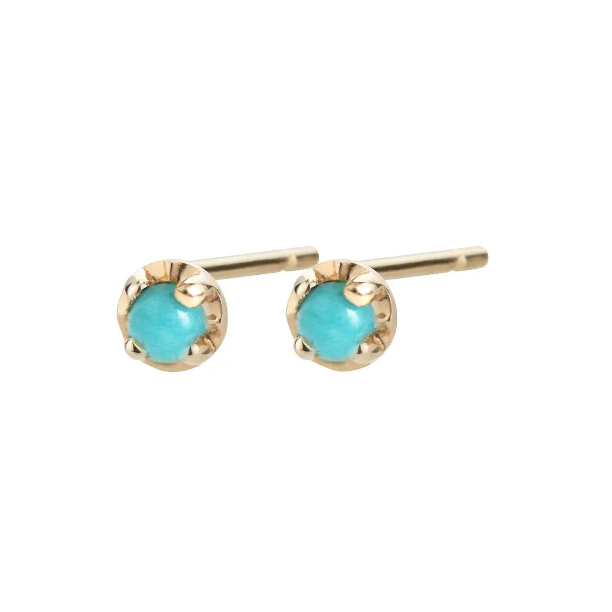 Turquoise droplets set in 14k yellow gold prongs. Dainty and delicate.   14k yellow gold earrings  Sold as a pair  Diameter of Setting: 3.75 mm  Aili Jewelry is made in New York City from recycled metals provided by sustainable certified companies and conflict free diamonds.