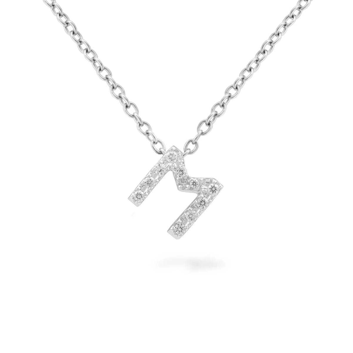 18K white gold necklace with letter pendant in white gold and diamonds .07 cttw  Length: 18 inches  If an item is out of stock, please allow 4-6 weeks for delivery  Designed by Piero Milano