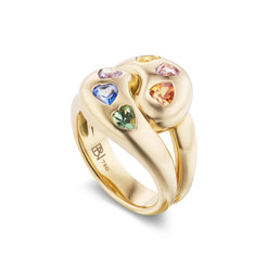 Wear this sparkling Brent Neale ring as a stylish alternative to your favorite cocktail ring. The 18K yellow gold knot is set with shimmering heart shaped multi-colored sapphires. Proudly wear this ring on a pointer or middle finger. The ring face is just under 3/4" and the band width is 5mm. The ring size is a 7 but Contact Us for a different size.