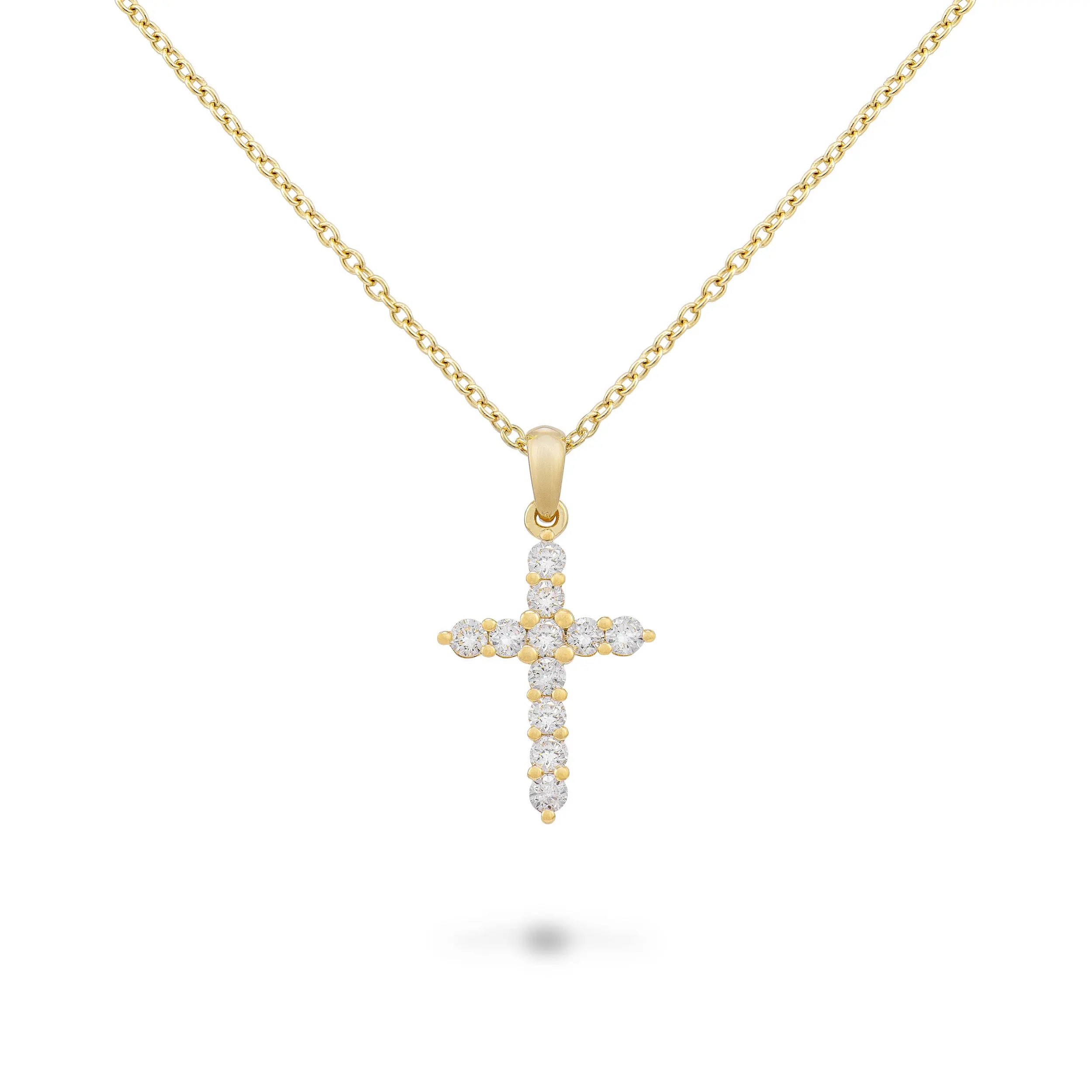 Classic and timeless icon of jewellery, with the combinations of gold and diamonds declined in several versions.   18k yellow gold with diamond .37 cttw pave cross necklace and chain.   Chain Length: 18 inches with a jump ring at 16 inches  Designed by Piero Milano