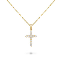Classic and timeless icon of jewellery, with the combinations of gold and diamonds declined in several versions.   18k yellow gold with diamond .37 cttw pave cross necklace and chain.   Chain Length: 18 inches with a jump ring at 16 inches  Designed by Piero Milano