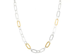 Mango Link necklace in sterling silver layered with 24K gold, with 4 gold links. Length is 18" with lobster clasp.   Designed by Gurhan