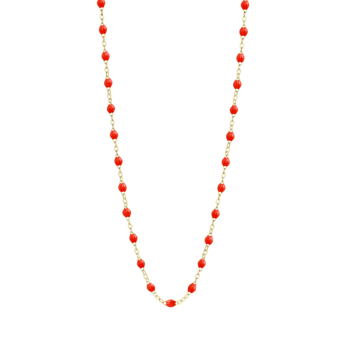 Stack you necklace layers with this versatile beaded chain! The Classic Gigi Necklace by gigi CLOZEAU features 18 carat yellow gold, and striking Coral resin jewels for an everyday effortless appearance. Handcrafted in 18k yellow gold. The beads measure 1.50mm in diameter and is finished with a spring ring clasp. The length is 16.5 inches.