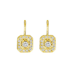 Emerald Shape Diamond Earrings with Center Diamond on French Wire  Details:  .52ct Diamond 18K Gold Desogned by Penny Preville and made in New York