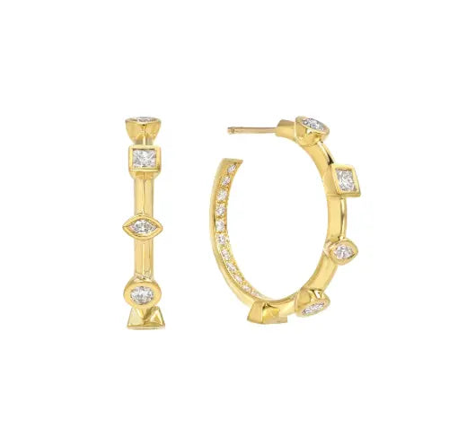 Alternating shaped diamonds keep you guessing along a knife edge hoop while the pave diamonds sweep up from behind. These hoops have a soft edge but classic and feature .94 ctw of diamonds.   If item is out of stock, please allow for 4-6 weeks for delivery  Designed by Meredith Young