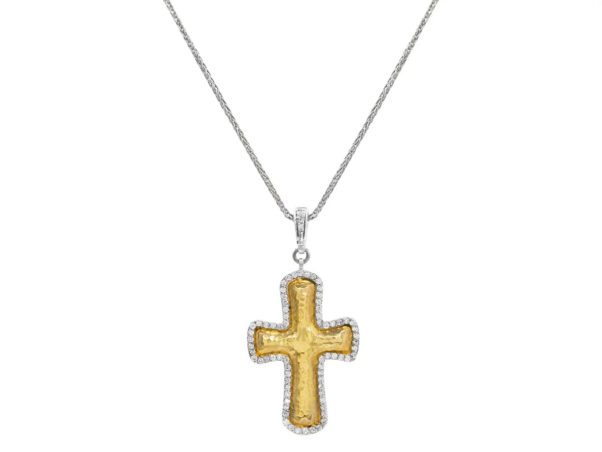 The Pave Cross Necklace is in Sterling Silver layered with 24k Gold outlined with white diamonds .61 cttw with a domed center. The cross measures 32x22mm with a detachable bale. The chain measures 16-18 inches.   Designed by Gurhan