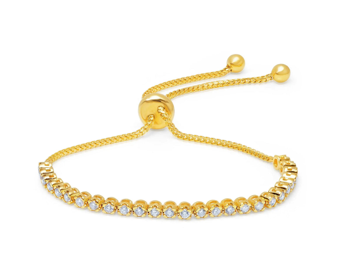 If you&#39;re looking for a simple diamond bracelet, you will love the bolo style. Easy to wear and adjust, you&#39;ll never want to take it off. 18k yellow gold with a brilliant white diamond over 1 cttw.   Details:  Gemstone: White Diamonds, 1 carat, G-H Metal: 18K Yellow Gold Sizing: 9 Inches Fully Adjustable Designed by Graziela Gems