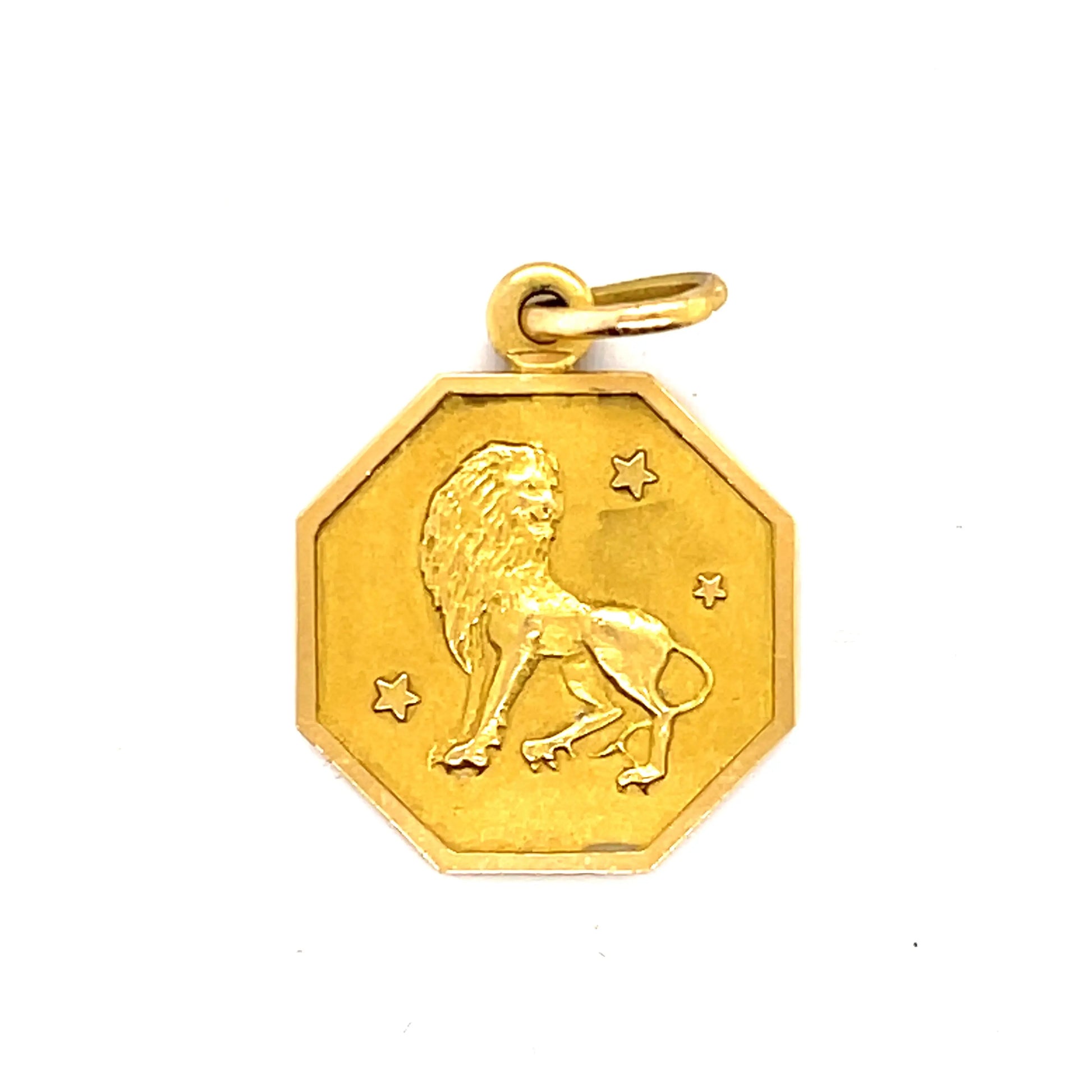 18k yellow gold griffin pendant  Great on its own or stacked with other charms.  One of a kind  The griffin is used to denote strength and military courage and leadership. Griffins are portrayed with the rear body of a lion, an eagle's head with erect ears, a feathered breast, and the forelegs of an eagle, including claws. These features indicate a combination of intelligence and strength.