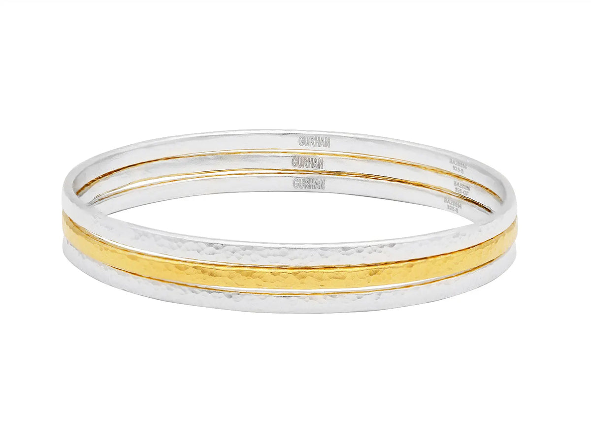 Plain Bracelet in Sterling Silver with 24k Gold Bonded. This includes 3 bangles. The dimensions are a width of 10 mm and a diameter is 65 mm.  Designed by Gurhan