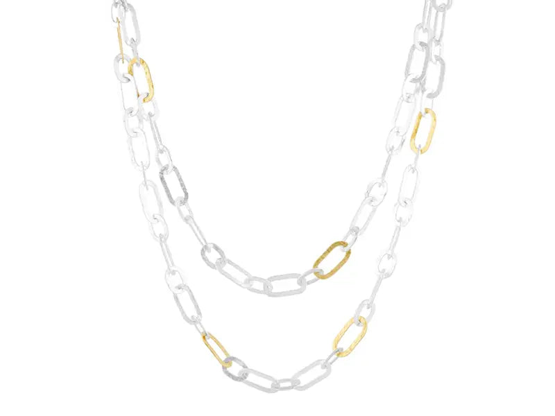 Mango Link necklace in sterling silver layered with 24K gold with 8 gold links. The length is 36 inches with a lobster clasp.  Designed by Gurhan