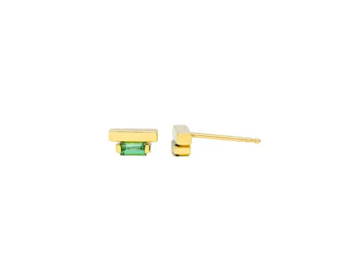 You'll be taking names and climbing ladders with these power studs. A polished gold bar atop a beautiful diamond baguette!   4x2mm tourmaline baguette paired with a high polish gold bar 18K recycled yellow gold Double notch recycled 18K post for added security Designed by Alex Fitz
