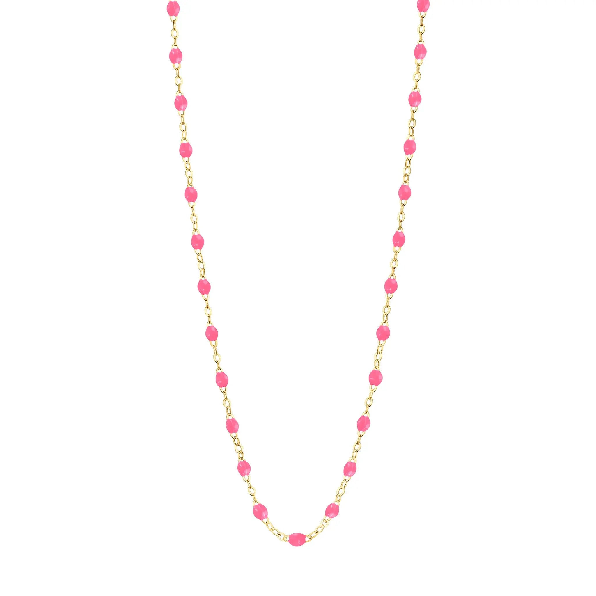 Stack you necklace layers with this versatile beaded chain! The Classic Gigi Necklace by gigi CLOZEAU features 18 carat yellow gold, and striking Pink resin jewels for an everyday effortless appearance. Handcrafted in 18k yellow gold. The beads measure 1.50mm in diameter and is finished with a spring ring clasp. The length is 16.5 inches.