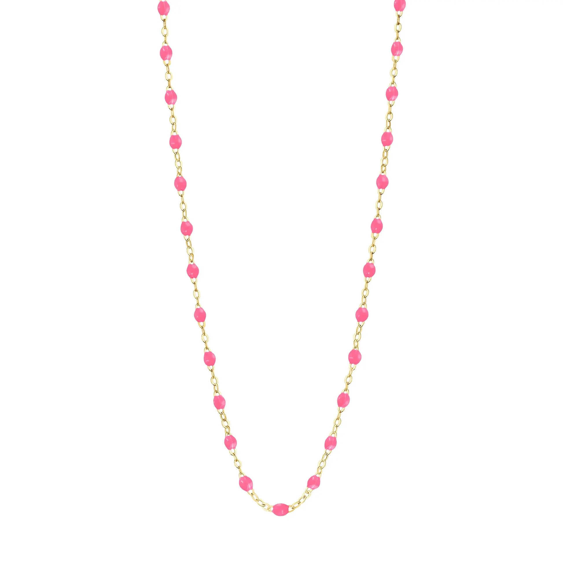 Stack you necklace layers with this versatile beaded chain! The Classic Gigi Necklace by gigi CLOZEAU features 18 carat yellow gold, and striking Pink resin jewels for an everyday effortless appearance. Handcrafted in 18k yellow gold. The beads measure 1.50mm in diameter and is finished with a spring ring clasp. The length is 19.7 inches.