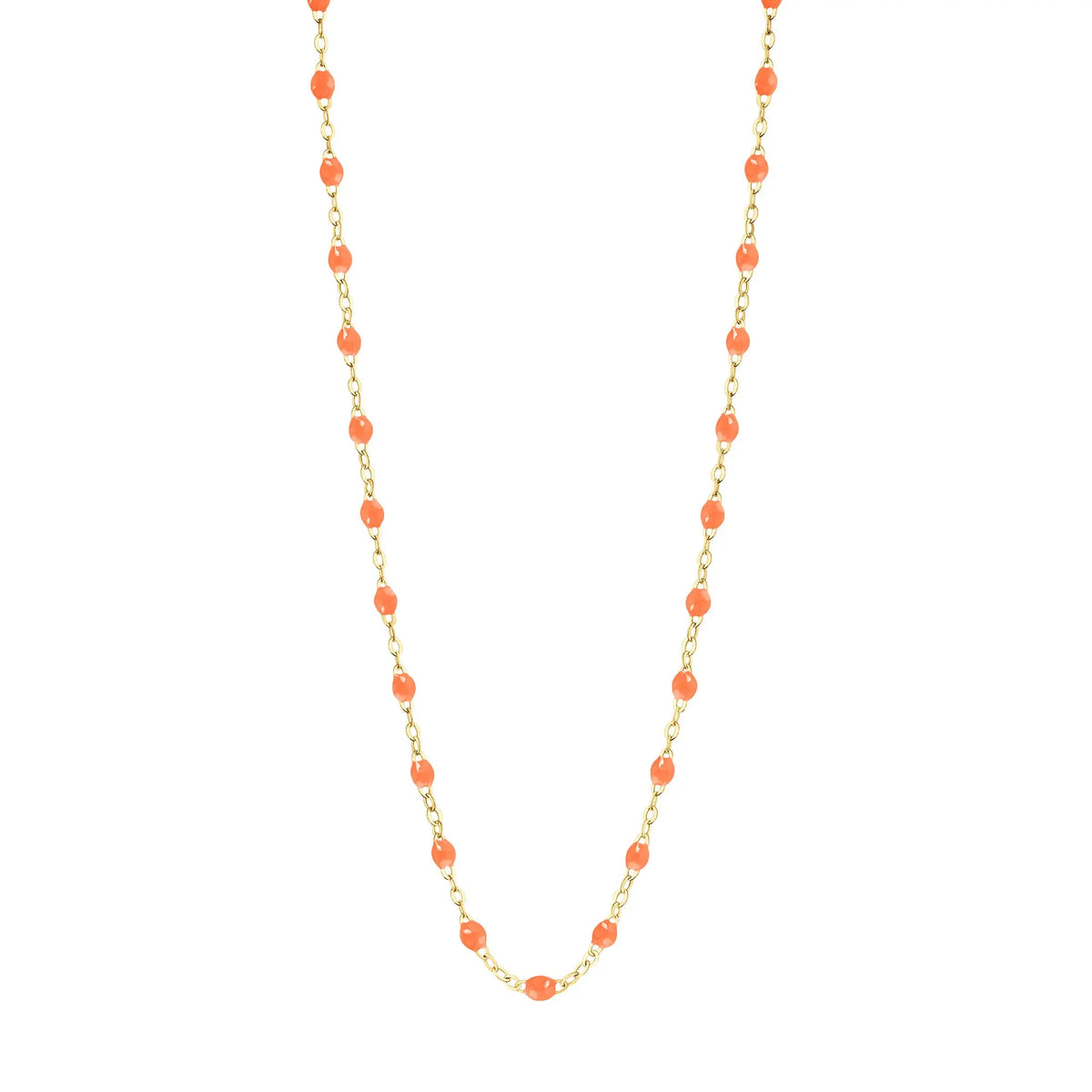 Stack you necklace layers with this versatile beaded chain! The Classic Gigi Necklace by gigi CLOZEAU features 18 carat yellow gold, and striking Orange resin jewels for an everyday effortless appearance. Handcrafted in 18k yellow gold. The beads measure 1.50mm in diameter and is finished with a spring ring clasp. The length is 16.5 inches.