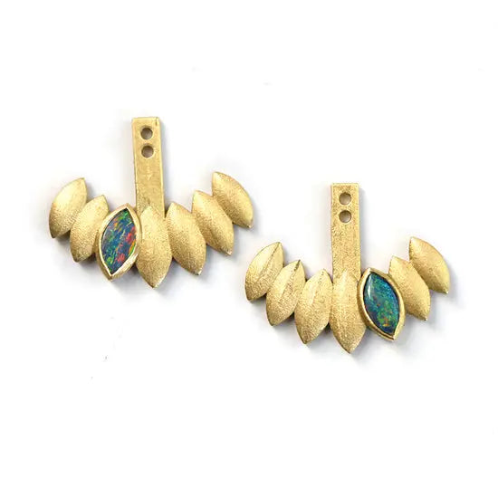 The 18K yellow gold petal earring jackets have become the most iconic design in the Samantha Louise collection. With two adjustable holes and a perfect curvature to trace the earlobe, you'll be amazed with how much fun you have with these.  Black Opal  Designed by Samantha Louise
