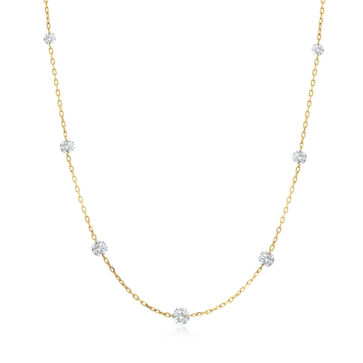 18K yellow gold floating diamond station necklace. Can be worn alone and a great stacking piece  Details:  Gemstone: 1/2 Carats (7 pieces) of G-H Color White Diamonds  Length: 18 inches and adjustable Closure: Spring Ring Designed by Graziela Gems