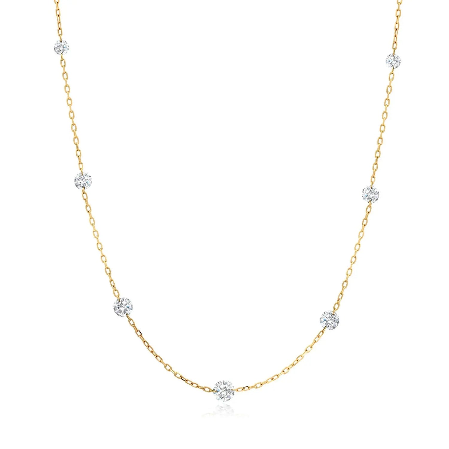 18K yellow gold floating diamond station necklace. Can be worn alone and a great stacking piece  Details:  Gemstone: 1/2 Carats (7 pieces) of G-H Color White Diamonds  Length: 18 inches and adjustable Closure: Spring Ring Designed by Graziela Gems