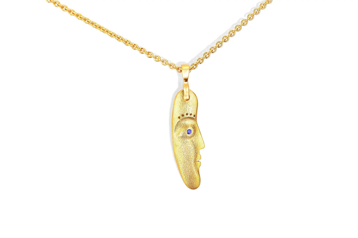 18k yellow gold sapphire and diamond &quot;The Big Sleep&quot; Pendant.  Details: 1 diamond .01ct, 1 sapphire .01ct. double sided pendant.  If you are interested in different stones or chain length, please email shop@sbvail.com.  If an item is out of stock, please allow 4-6 weeks for delivery.  Designed by Alex Sepkus