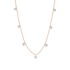 18k rose gold with 7 floating white diamonds  Details  1.03cts of White Diamonds 2.19g of 18K Gold Necklace is 18 and Completely Adjustable Please allow 4-6 weeks for delivery, if item is out of stock.   Designed by Graziela Gems