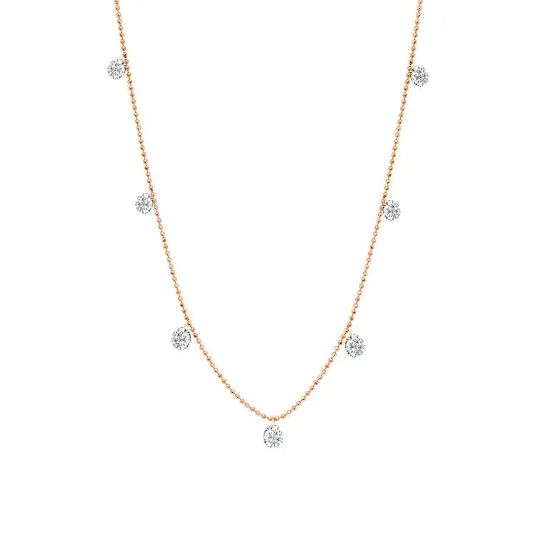 18k rose gold with 7 floating white diamonds  Details  1.03cts of White Diamonds 2.19g of 18K Gold Necklace is 18 and Completely Adjustable Please allow 4-6 weeks for delivery, if item is out of stock.   Designed by Graziela Gems