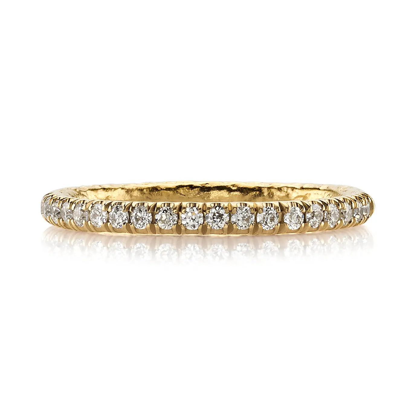 18k Yellow Gold with Approximately 0.24ctw G-H/VS old European cut diamonds pave set in a handcrafted hammered 22K yellow gold half eternity band.   Size: 6.5  If you need a different size, please email shop@sbvail.com. If an item is out of stock, please allow 6-8 weeks for delivery.  Designed by Single Stone and made in LA