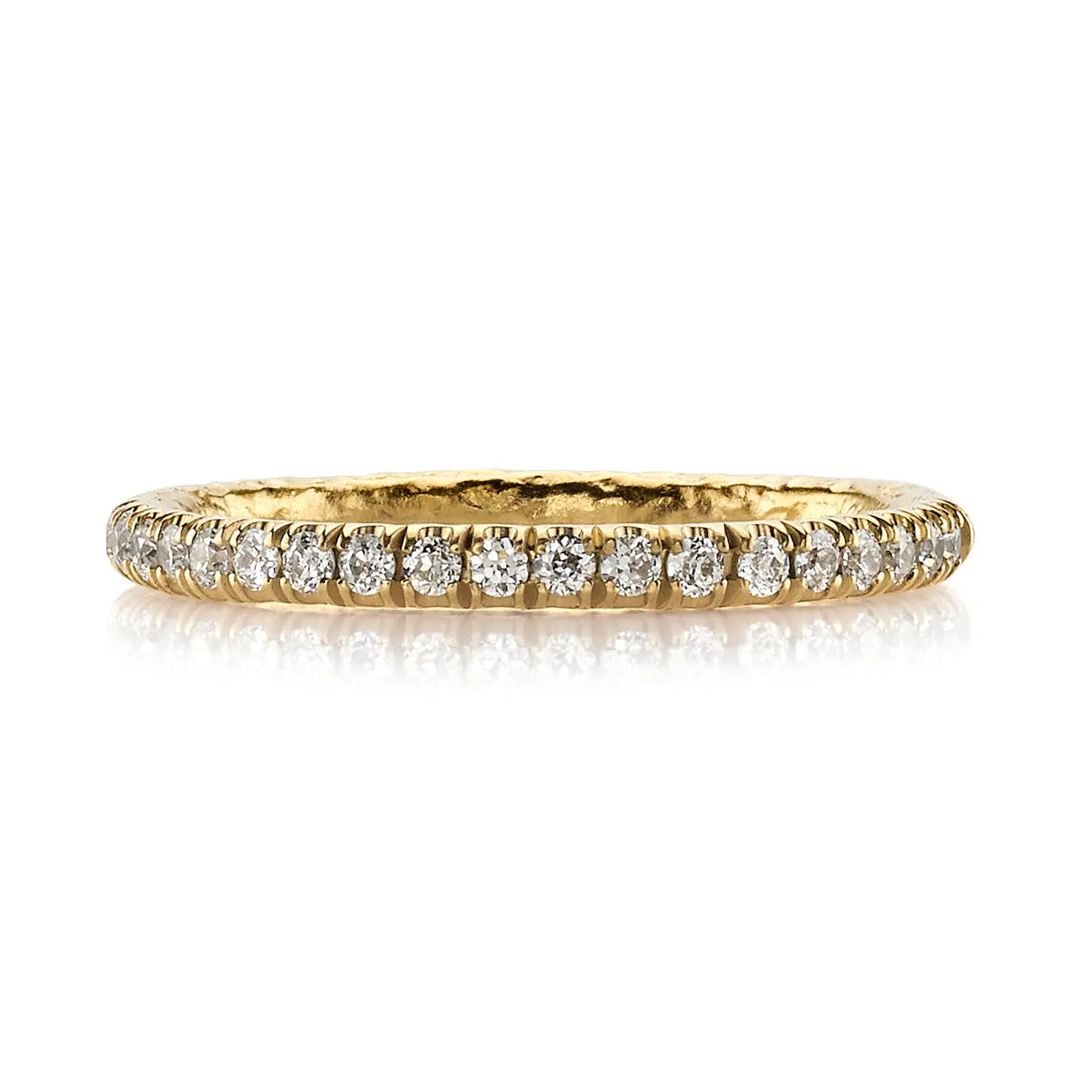18k Yellow Gold with Approximately 0.24ctw G-H/VS old European cut diamonds pave set in a handcrafted hammered 22K yellow gold half eternity band.   Size: 6.5  If you need a different size, please email shop@sbvail.com. If an item is out of stock, please allow 6-8 weeks for delivery.  Designed by Single Stone and made in LA