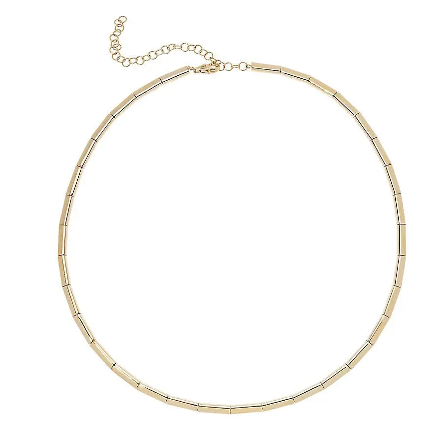 The perfect statement gold necklace. It is adjustable so that you can wear it at choker length or longer, making it super easy to layer into your neck party.    14 karat yellow gold   16" in length, adjustable to 13" . Designed by Lee Jones