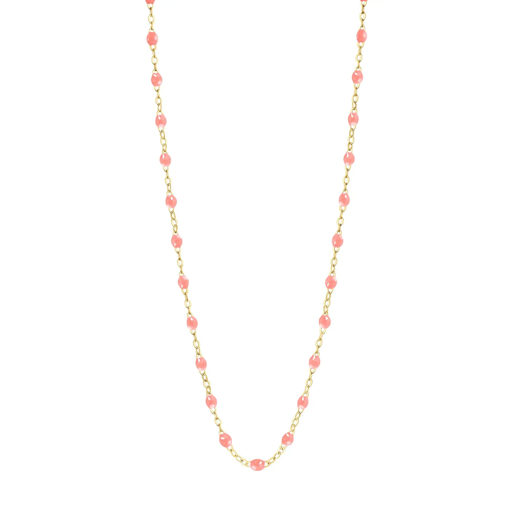 Stack you necklace layers with this versatile beaded chain! The Classic Gigi Necklace by gigi CLOZEAU features 18 carat yellow gold, and striking Fuchsia resin jewels for an everyday effortless appearance. Handcrafted in 18k yellow gold. The beads measure 1.50mm in diameter and is finished with a spring ring clasp. The length is 16.5 inches.