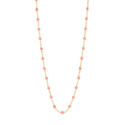 Stack you necklace layers with this versatile beaded chain! The Classic Gigi Necklace by gigi CLOZEAU features 18 carat yellow gold, and striking Fuchsia resin jewels for an everyday effortless appearance. Handcrafted in 18k yellow gold. The beads measure 1.50mm in diameter and is finished with a spring ring clasp. The length is 16.5 inches.
