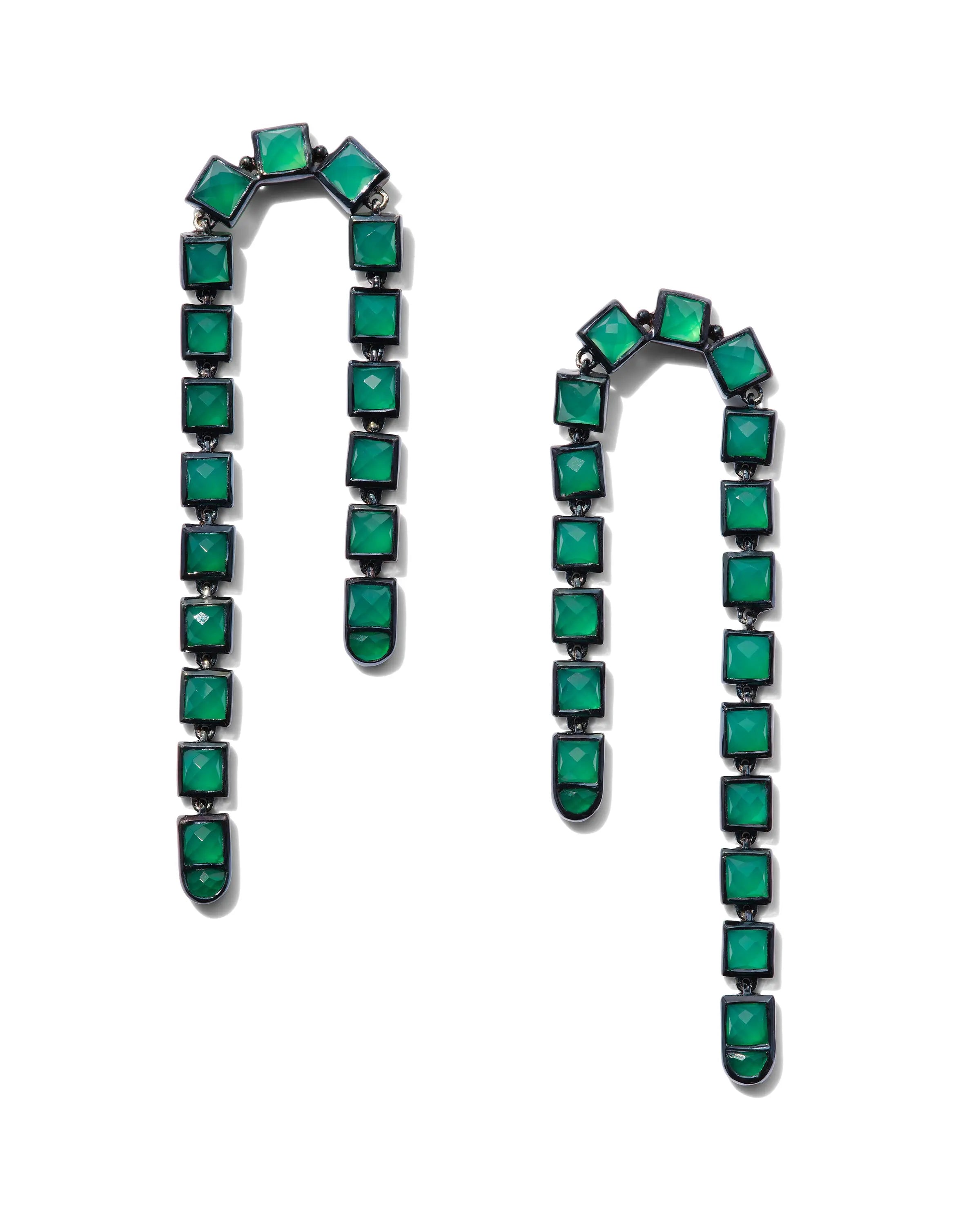 Designed by Nak Armstrong these earrings are so much fun. The set in sterling silver with a black rhodium finish and green onyx 3.5 square mm. The measure 2 1/2" in length and are post and nut closure.