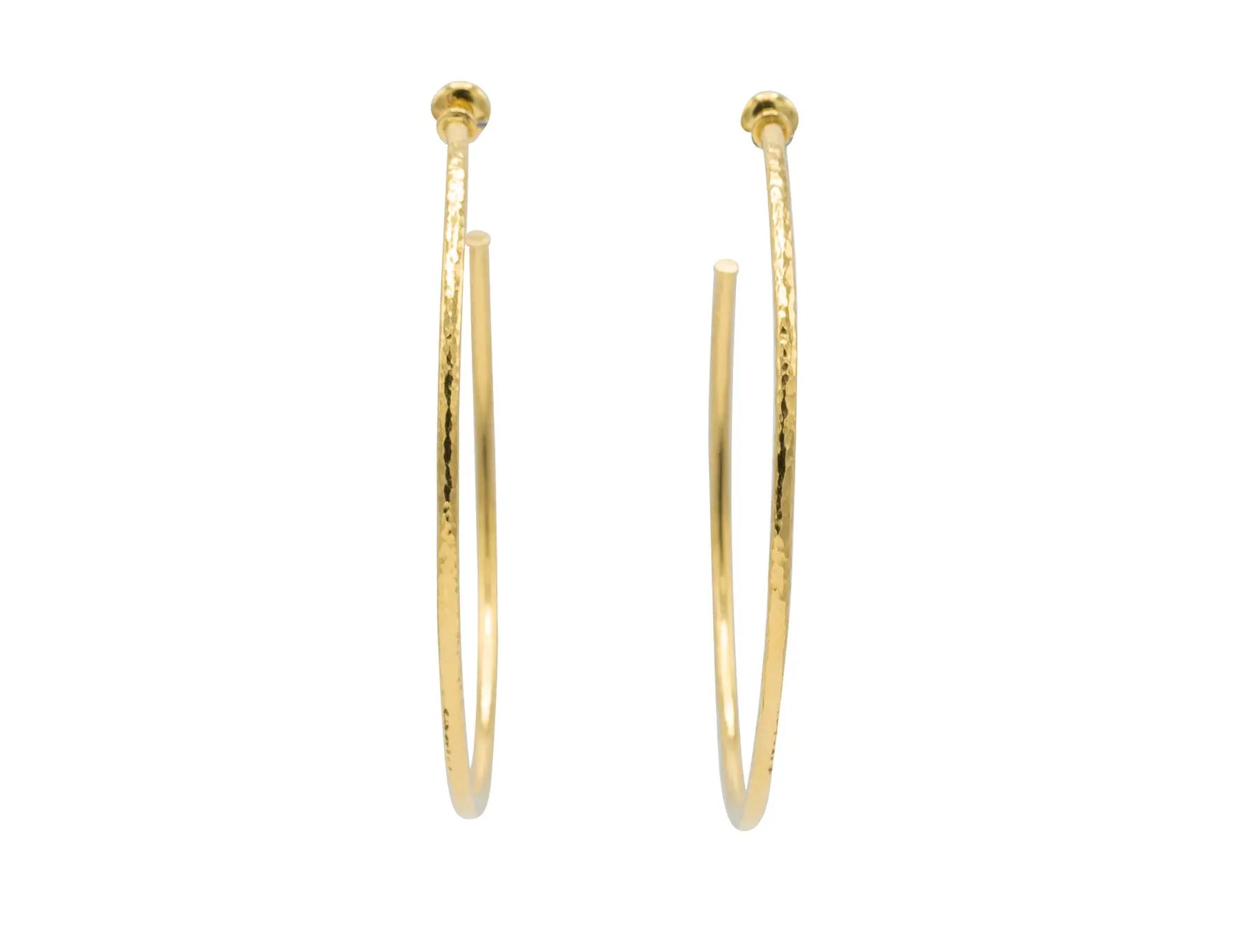 These Hoops are staples in your jewelry box. These are 24k yellow gold by Gurhan. Hoop Earrings in 22k yellow gold and are from the Vertigo Collection. The length on these hoops are 2.75 inches