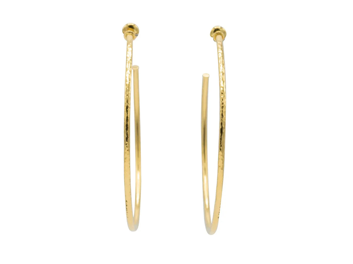 These Hoops are staples in your jewelry box. These are 24k yellow gold by Gurhan. Hoop Earrings in 22k yellow gold and are from the Vertigo Collection. The length on these hoops are 2.75 inches