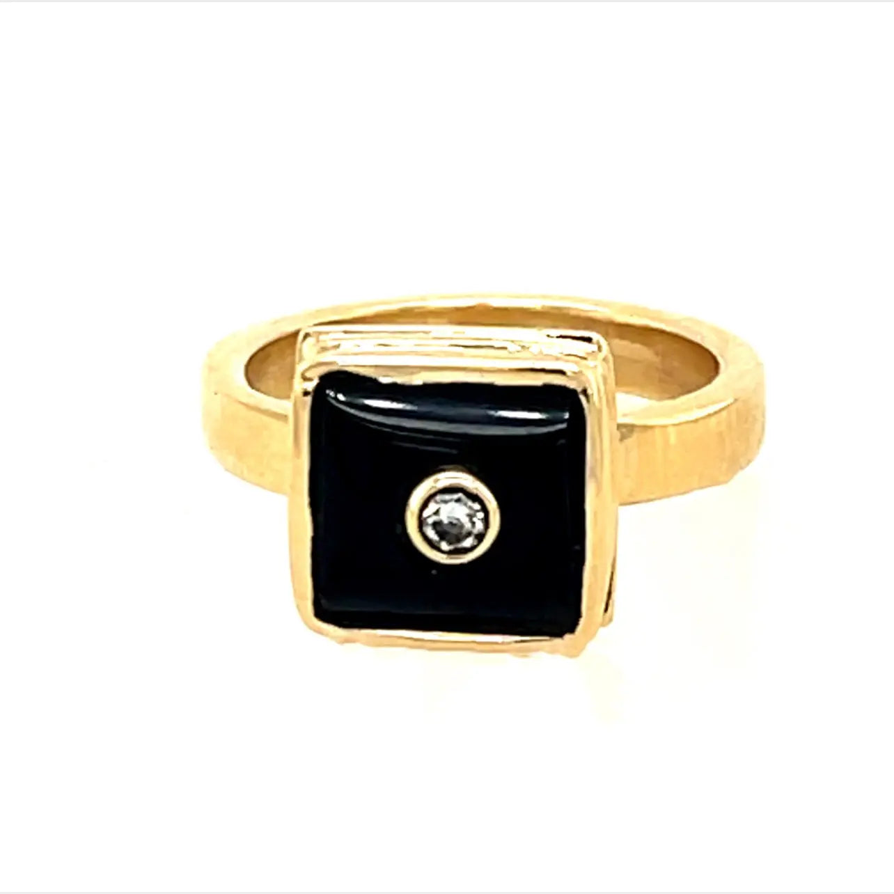 A great ring on its own or stacked.   14k yellow gold with onyx and diamond ring  Size: 4