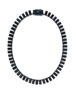 Designed by Nak Armstrong this necklace is great on its own or layered.  They are set in sterling silver with blue rhoduim and baguette black spinel 9 mm. The necklace measure 16 in length.