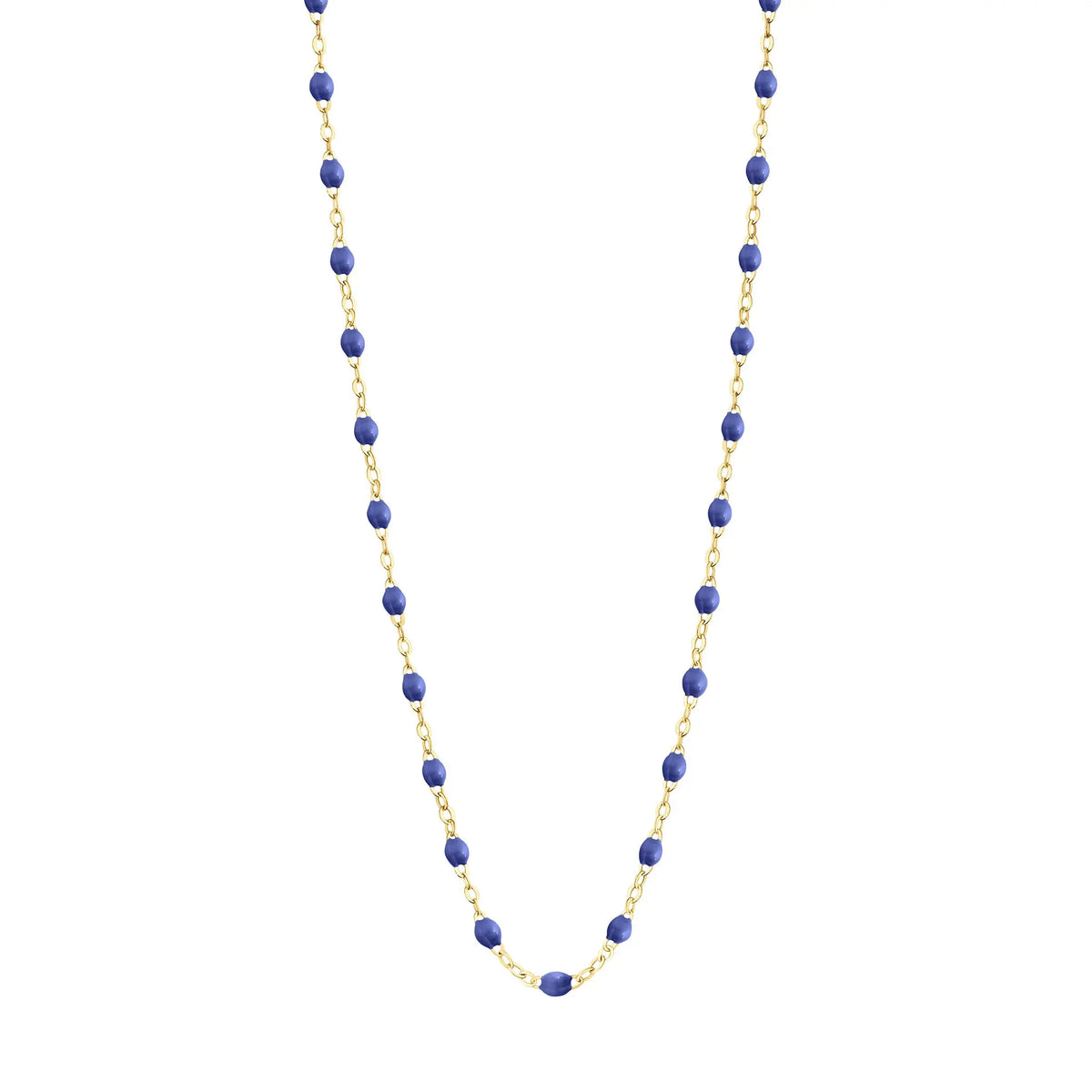 Stack you necklace layers with this versatile beaded chain! The Classic Gigi Necklace by gigi CLOZEAU features 18 carat yellow gold, and striking Blue resin jewels for an everyday effortless appearance. Handcrafted in 18k yellow gold. The beads measure 1.50mm in diameter and is finished with a spring ring clasp. The length is 16.7 inches.