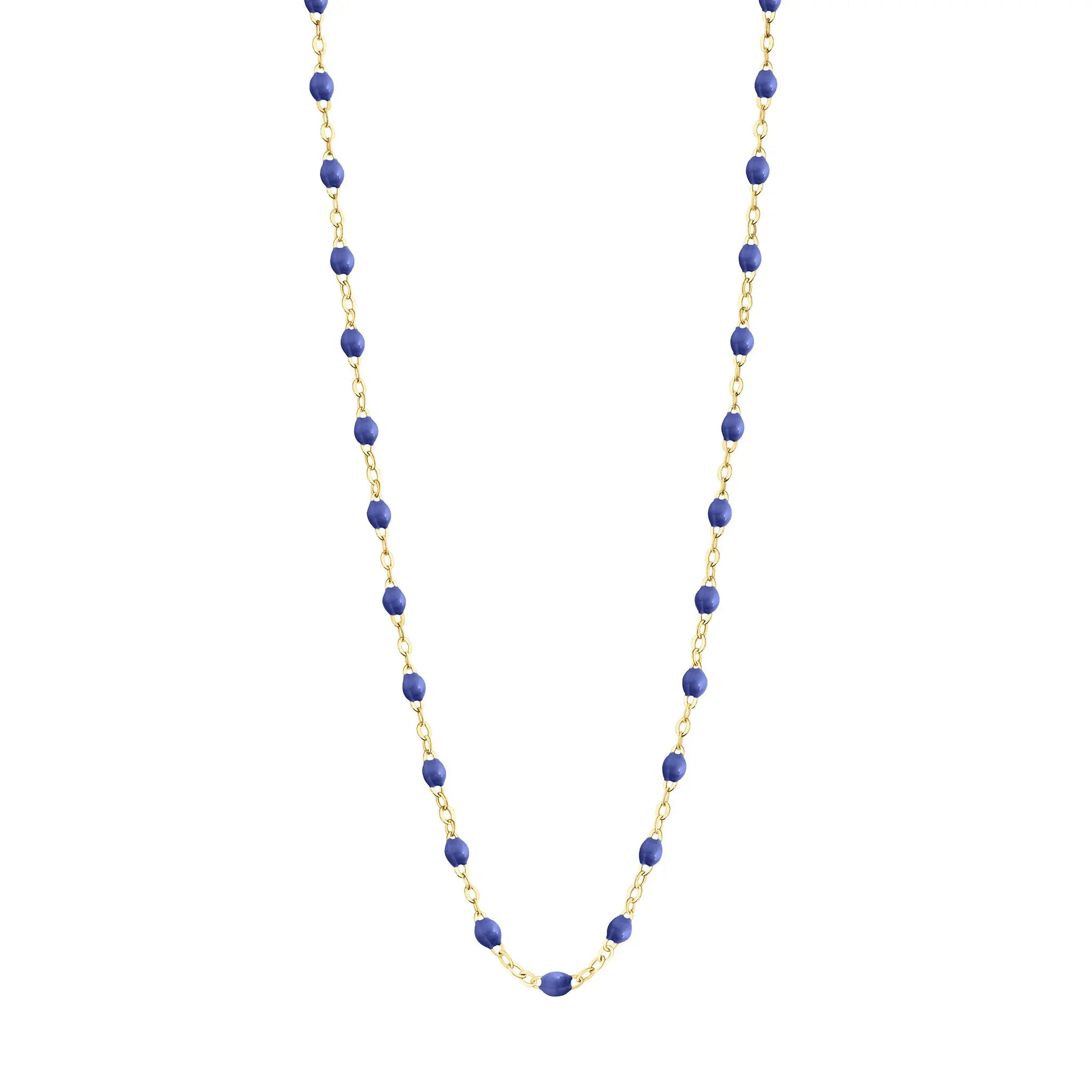 Stack you necklace layers with this versatile beaded chain! The Classic Gigi Necklace by gigi CLOZEAU features 18 carat yellow gold, and striking Blue resin jewels for an everyday effortless appearance. Handcrafted in 18k yellow gold. The beads measure 1.50mm in diameter and is finished with a spring ring clasp. The length is 19.7 inches.