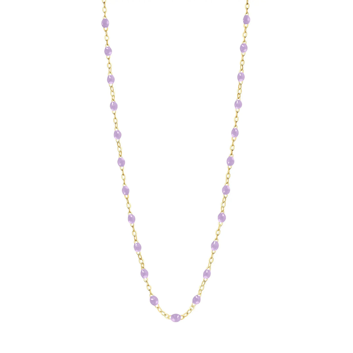 Stack you necklace layers with this versatile beaded chain! The Classic Gigi Necklace by gigi CLOZEAU features 18 carat yellow gold, and striking Lilac resin jewels for an everyday effortless appearance. Handcrafted in 18k yellow gold. The beads measure 1.50mm in diameter and is finished with a spring ring clasp. The length is 16.5 inches.