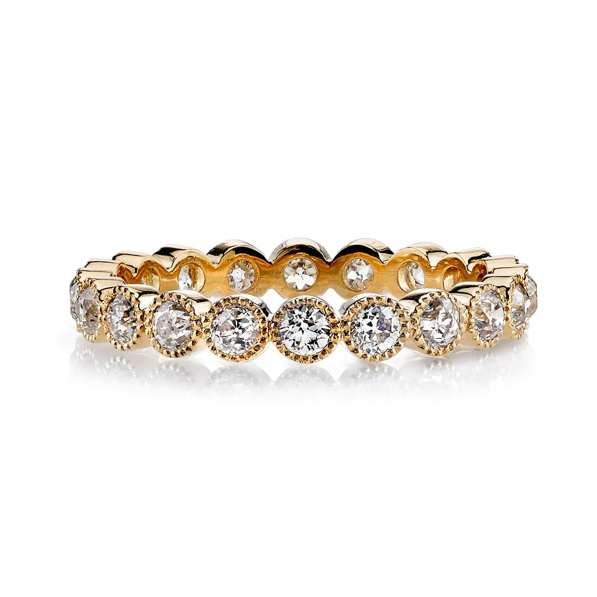 18k Yellow Gold with Approximately 1.00ctw G-H/VS old European cut diamonds bezel set in a handcrafted eternity band.   Ring Size: 6.5  If you need a different size, please email shop@sbvail.com. If an item is out of stock, please allow 6-8 weeks for delivery.  Designed by Single Stone and made in LA