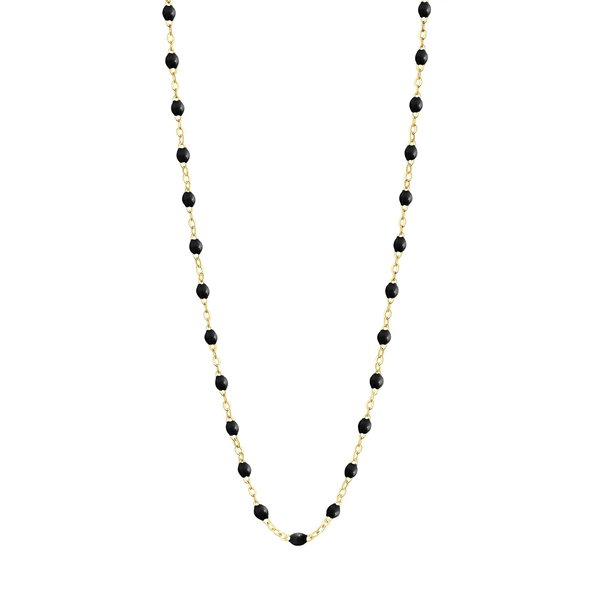 Stack you necklace layers with this versatile beaded chain! The Classic Gigi Necklace by gigi CLOZEAU features 18 carat yellow gold, and striking Black resin jewels for an everyday effortless appearance. Handcrafted in 18k yellow gold. The beads measure 1.50mm in diameter and is finished with a spring ring clasp. The length is 19.7 inches.