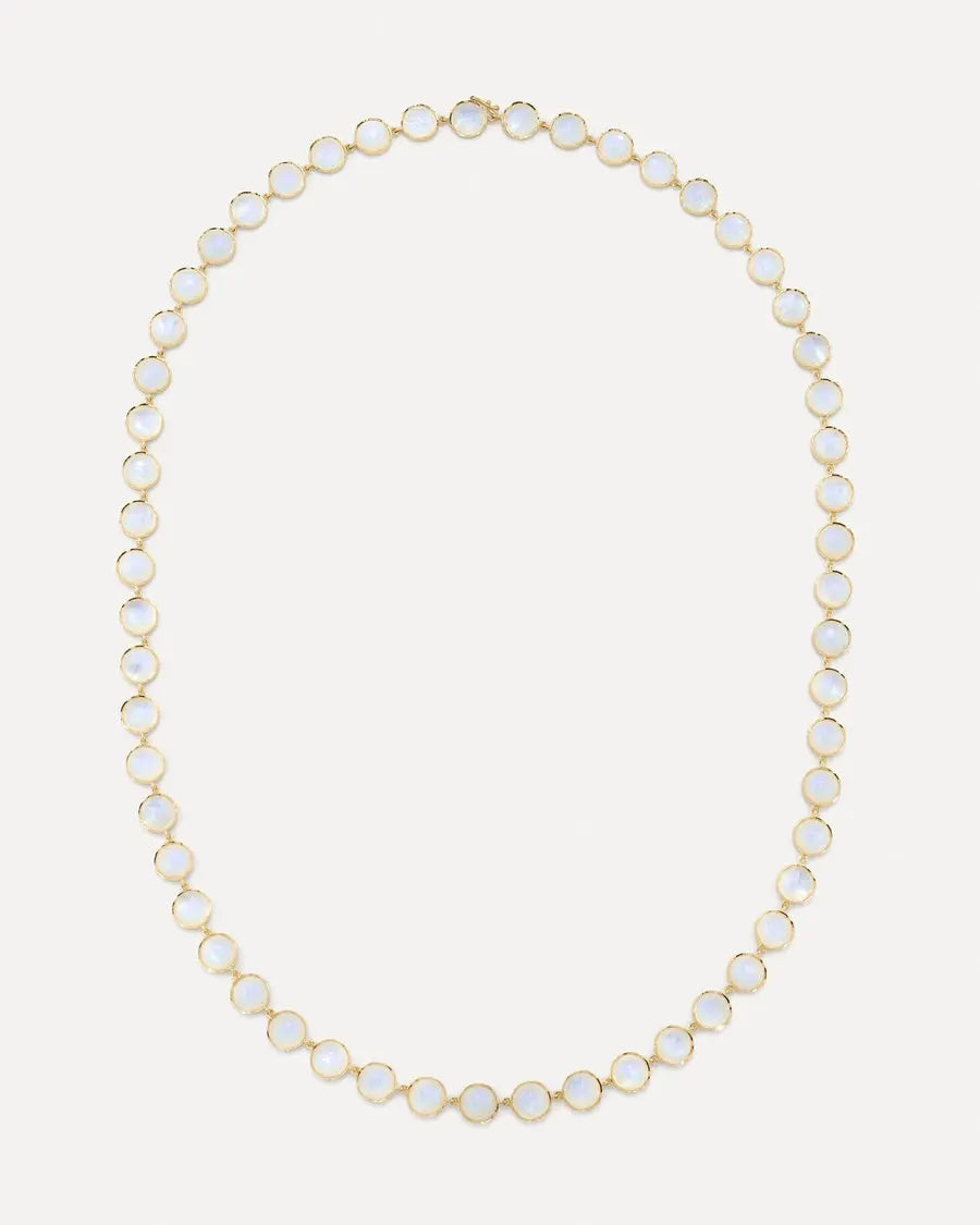 This long link necklace highlights the beauty of rainbow moonstone cabochons scalloped coin-edge set in 18k yellow gold.  18k yellow gold and Rainbow Moonstone  34 inches in length  Designed by Irene Neuwirth and handmade in Los Angeles