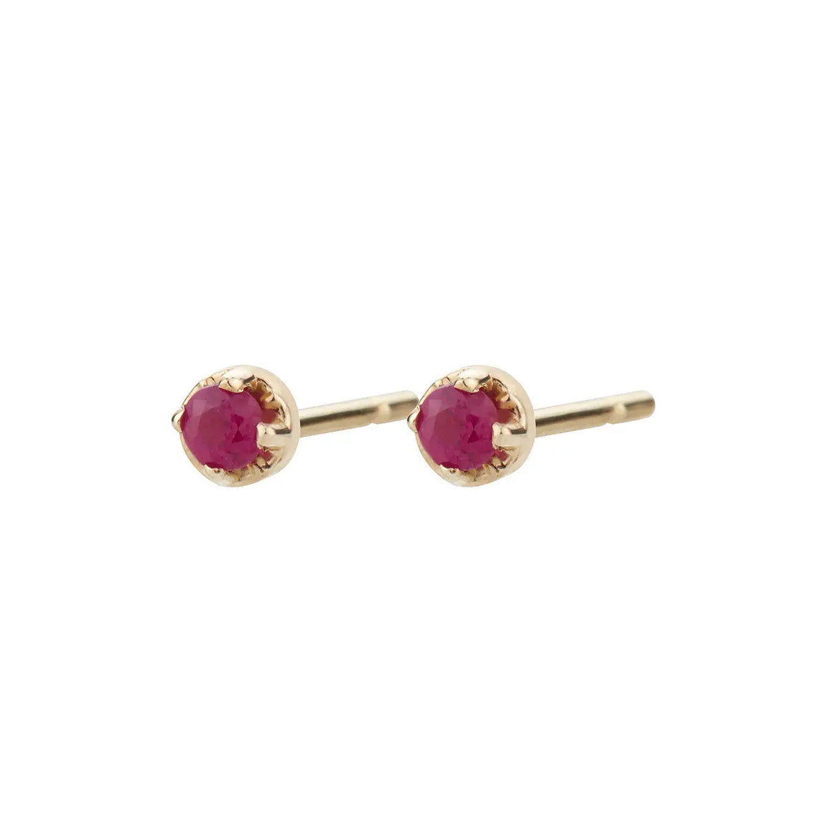 Sparkling rubies set in 14k yellow gold prongs. Dainty and delicate.   14k yellow gold earrings  Aili Jewelry is made in New York City from recycled metals provided by sustainable certified companies and conflict free diamonds.
